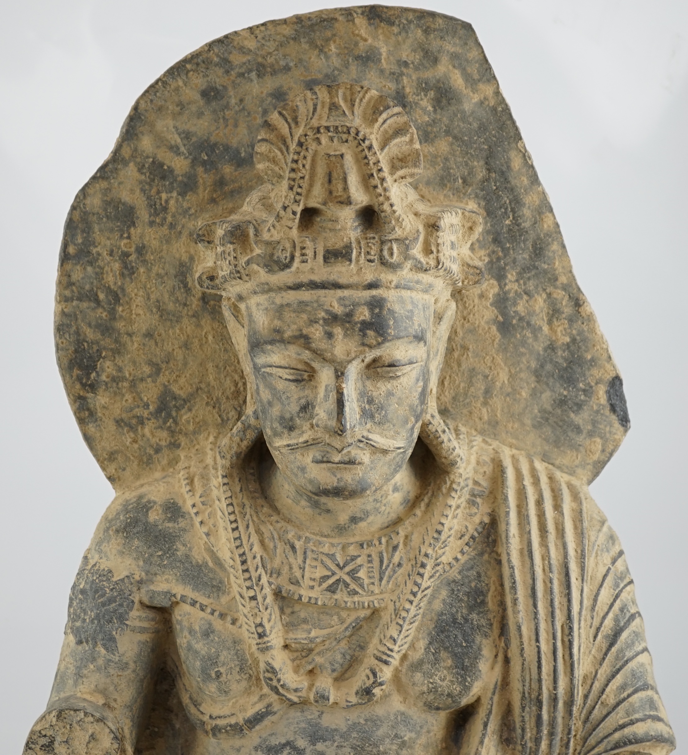 A large grey schist Bodhisattva figure, Gandhara, 2nd/3rd century A.D.